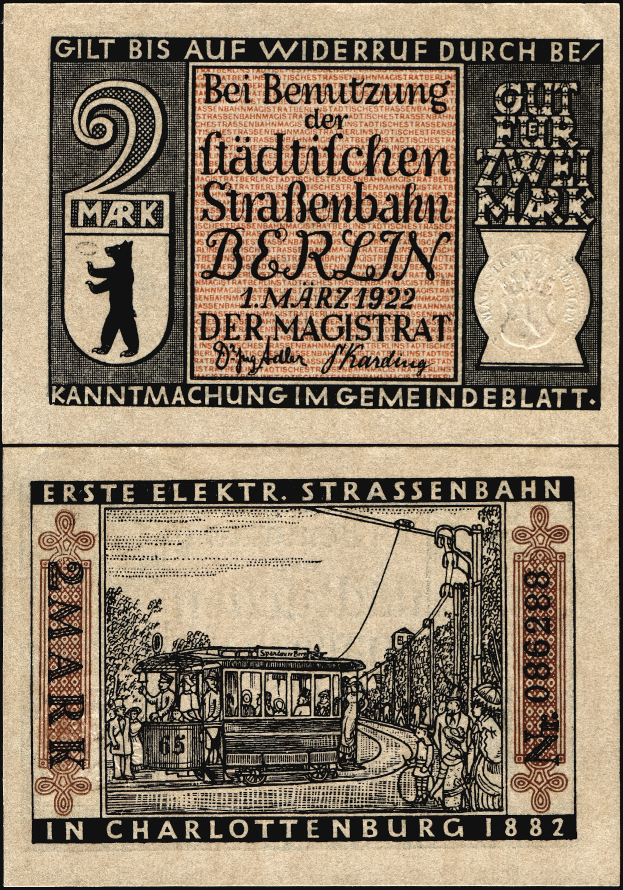Eine alte deutsche Banknote mit einem Zug darauf und Text auf dem Papier.