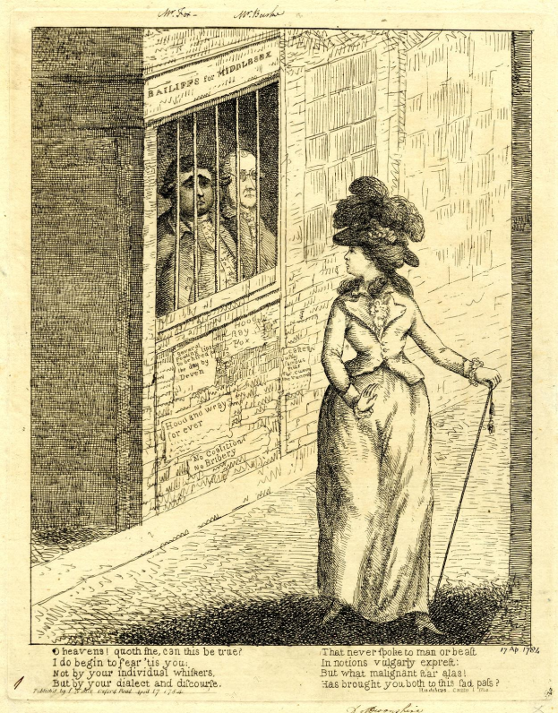 Eine Frau steht vor einer Zelle und hält einen Stock in der Hand, mit Menschen in der Zelle und Text unten.