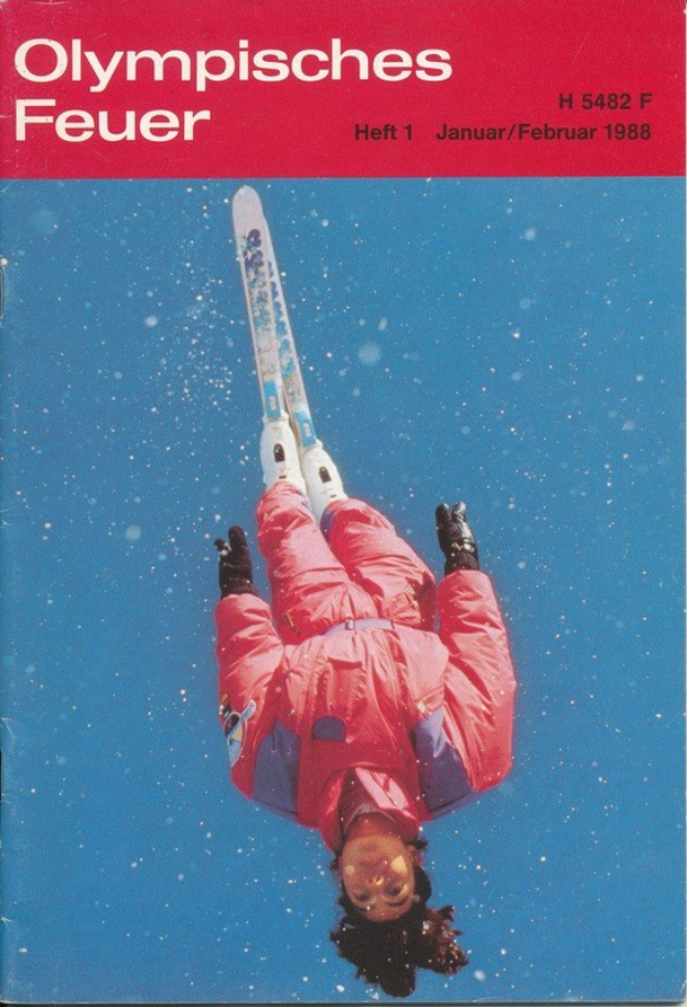 Titelbild einer Olympia-Magazinausgabe von 1988 mit einem Skispringer in rot-weißer Kleidung in der Luft, mit dem Text "Olympische Spiele Feuer - Heft 1 - Januar/Februar 1988"