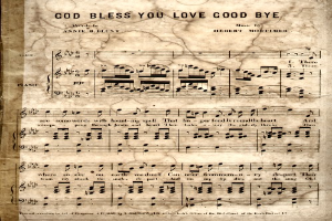 Ein altes Notenblatt mit der Aufschrift 'God Bless You Love Goodbye' und musikalischen Noten und Symbolen.
